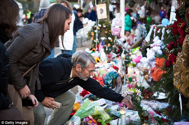 Tragic: One of the points of professor James Tracy's argument is the fact that there have been no photos of the bodies of the 20 child victims or the six teachers