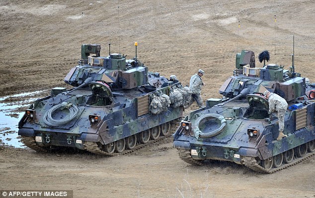 Tinkering with the tanks: The U.S. is preparing to intercept any missile after it emerged the communist state's weapons system was 'fuelled and ready to launch'