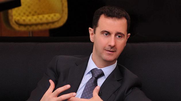 A handout photo distributed by Syrian News Agency (SANA) on July 3, 2012, shows Syria's President Bashar al-Assad during an interview with a Turkish newspaper in Damascus. UPI